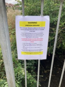 Warning uneven ground take extra care. ground conditions in this area are uneven and large holes and cracks are currently in the field. recent weather and ground movement have caused multiple areas develop large holes, depressions and trip hazards. additional holes may also have been dug by dogs, foxes and other animals. Please keep to safe routes, watch your step and avoid any damaged or sunken areas. children must be supervised at all times. do not run, cycle or play on uneven or damaged ground. keep dogs under control and away from holes or collapsed areas. report any new holes, collapses or safety concerns immediately. use of this area is at your own risk. the council is inspecting the area and arranging remedial works where required. to report a hazard, contact polegate town council admin@polegatetowncouncil.gov.uk