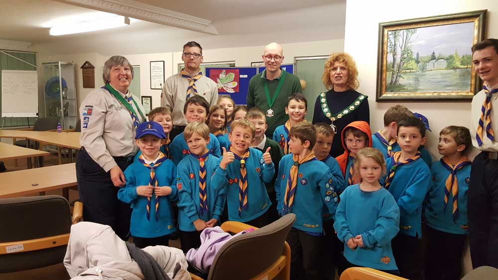 A happy group of beaver scouts visiting the town hall