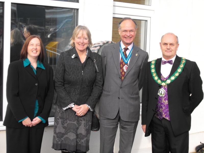 The high sheriff mayor steve barber and two ladies in fron of the town hall
