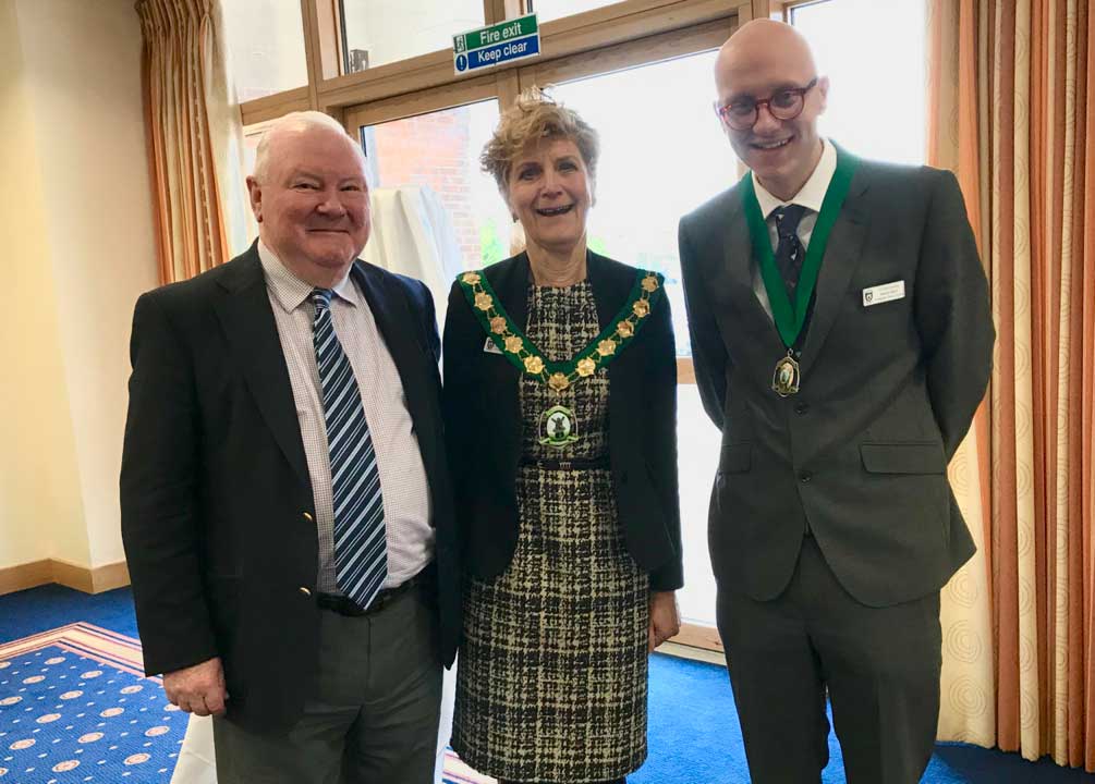 A prayer breakfast attendee meets mayor angela snell and deputy mayor dan dunbar
